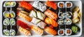 Artfully arranged sushi platter in soft light a minimalist display of culinary harmony