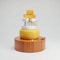 Artfully Stacked Cheese Assortment on a Wooden Board Royalty Free Stock Photo