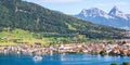Arth at lake Zug in the Swiss Alps mountains with Kleiner and Grosser Mythen mountain peaks panorama in Switzerland Royalty Free Stock Photo