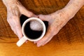 Arthritic Hands & Coffee Cup Royalty Free Stock Photo