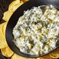 artichoke spinach almond dip with potato chips Royalty Free Stock Photo