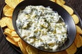 artichoke spinach almond dip with potato chips Royalty Free Stock Photo