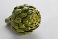 Artichoke on white table Royalty Free Stock Photo