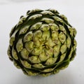 Artichoke on white table Royalty Free Stock Photo