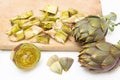 Artichokes on chopping board