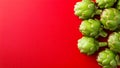 Artichokes on red backdrop Royalty Free Stock Photo