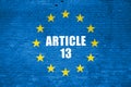 Article 13 inscription and european union flag on blue brick wall Royalty Free Stock Photo