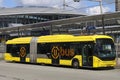 Articulated city bus in yellow colour of U-OV in the city of Utrecht runned by QBUZZ