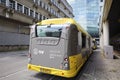 Articulated city bus in yellow colour of U-OV in the city of Utrecht runned by QBUZZ