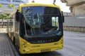 Articulated city bus in yellow colour of U-OV in the city of Utrecht runned by QBUZZ