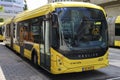 Articulated city bus in yellow colour of U-OV in the city of Utrecht runned by QBUZZ