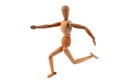 Articulated wooden mannequin running on white background