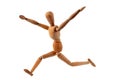 Articulated wooden mannequin running on white background