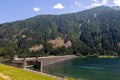 Artificial alpine reservoir lake Zoccolo and mountain range at Ultental, South Tyrol Italy Royalty Free Stock Photo