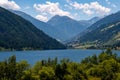 Artificial alpine reservoir lake Zoccolo Zoggler-Stausee and mountain range at Ultental, South Tyrol Royalty Free Stock Photo