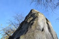 Artificial boulder in shape of an alpine mountain or dragon tooth. used to train climbers in a city park. The top stone is made of