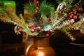 Artificial Christmas plants in a copper vase