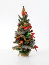 Artificial christmas tree on a white background Royalty Free Stock Photo