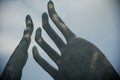 Artificial concrete human fingers statue around a recreation park in Kolkata