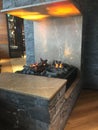 Artificial electronic fireplace. Close-up of electrical fireplace in room