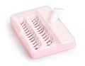 Artificial false eyelashes with glue isolated on white