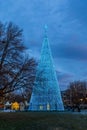 Artificial fir tree with colorful Christmas decorations LED strip light in the Denver Civic Center park