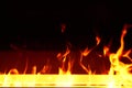 Artificial fireplace. Burning logs. Decorative fire Royalty Free Stock Photo