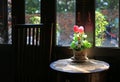 Artificial flowers in brown sack vase on the table at old cafe. Vintage restaurant in dark tone