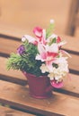Artificial Flowers In Vase On Wooden Table Royalty Free Stock Photo