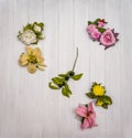 Artificial flowers on a wooden board Royalty Free Stock Photo