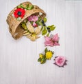 Artificial flowers on a wooden board Royalty Free Stock Photo