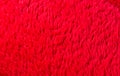 Artificial fur red background texture fabric felt Royalty Free Stock Photo