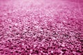 Artificial grass with blur effect in pink tone Royalty Free Stock Photo