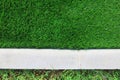 Artificial grass is laid in the sports field.