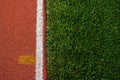 Artificial grass and run track texture Royalty Free Stock Photo