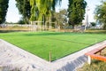 Artificial green grass on the playground. plastic lawn