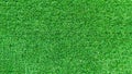 Artificial green grass texture or green grass background for golf course. soccer field or sports background Royalty Free Stock Photo