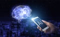 Artificial intelligence AI . Hand hold white smartphone with digital hologram Brain sign on city dark blurred background. Virtual