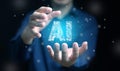 Artificial Intelligence concept. Hands of a man carry an AI text with circuit pattern, glowing bright in the dark. Ai technology