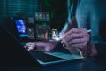 Artificial intelligence data analytics concept. Professional using laptop with dashboard, machine learning charts, real time data Royalty Free Stock Photo