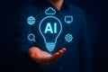 Artificial intelligence innovation concept with glowing idea bulb above hand Royalty Free Stock Photo