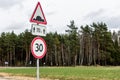 Artificial irregularity and speed limit 30 sign