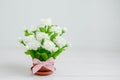 Artificial Jasmine flower bouquet with pink ribbon bow