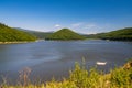 Artificial lake Zetea on Tarnava Mare river, Eastern Carpathians, Romania Royalty Free Stock Photo