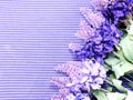 Artificial lavender flowers bouquet on fabric background Royalty Free Stock Photo