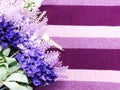 Artificial lavender flowers bouquet on fabric background Royalty Free Stock Photo