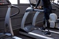 artificial legs running on treadmill. cropped side view shot Royalty Free Stock Photo