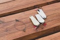 artificial metal baits on a wooden background. Homemade fishing gear