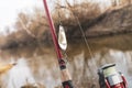 artificial metal baits on a wooden background. Homemade fishing gear