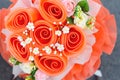 Artificial orange rose flowers bouquet Royalty Free Stock Photo